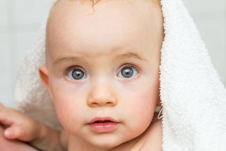 Baby laughing and crawling